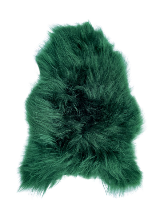 Aito tummanvihreä islanninlampaantalja. BääBää-lampaantalja – lämmin ja luonnollinen sisustusidea sohvalle, tuolille tai lattialle. Uniikit taljat, lahjaideat ja sisustustuotteet BääBää-verkkokaupasta.